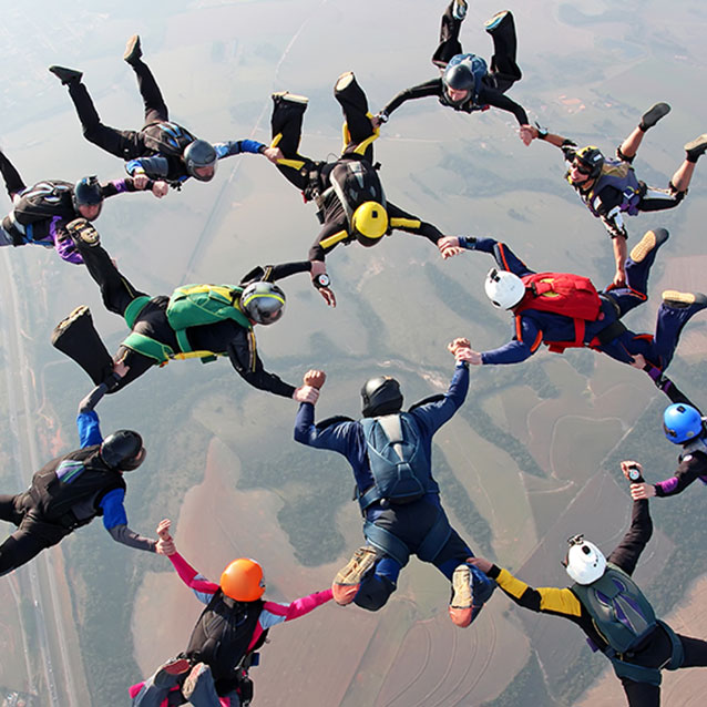 photo of skydivers in formation