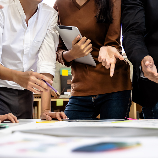 A team meeting in modern office planning ideas on effectively communicating