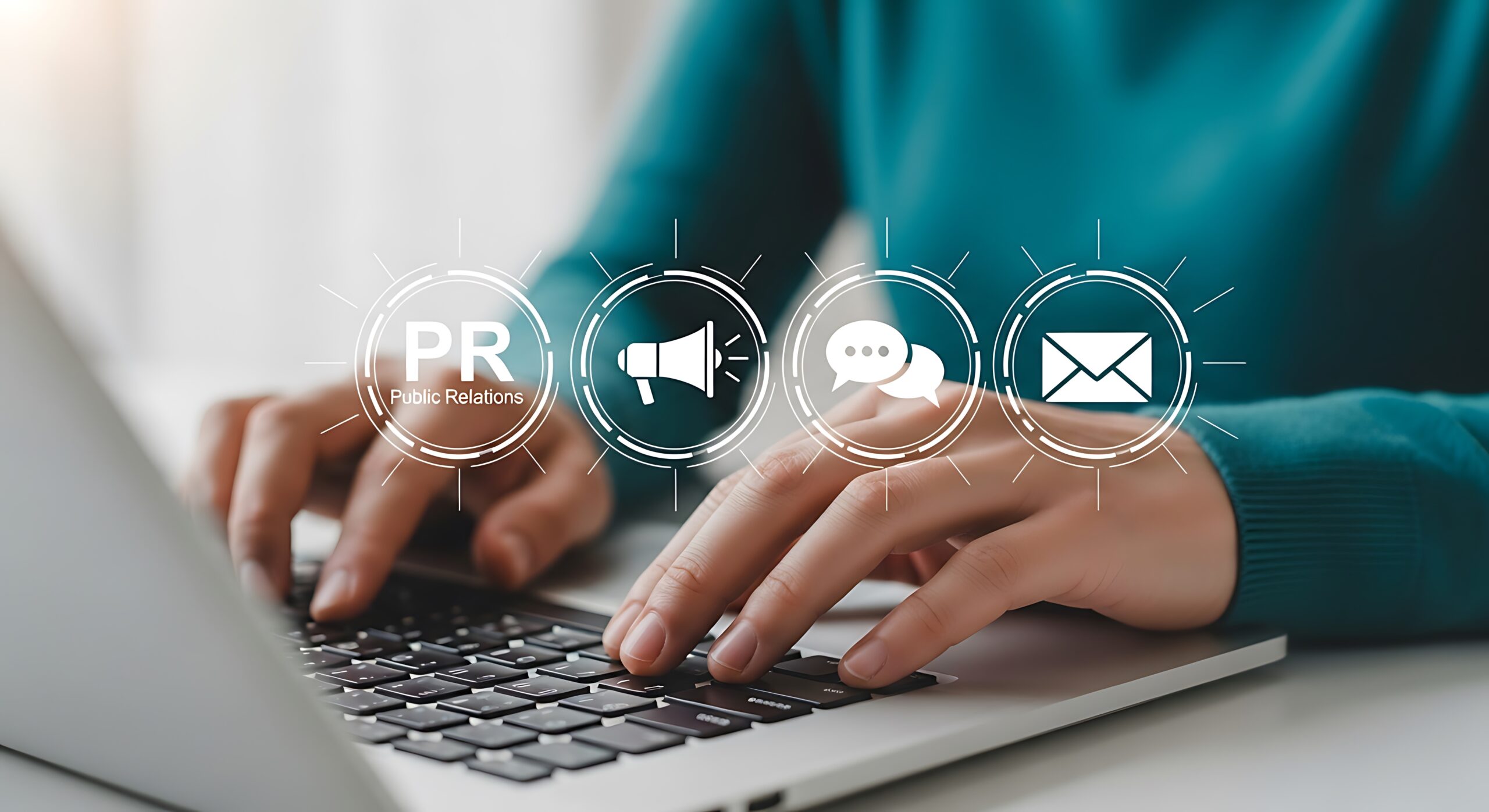 individual typing content on a laptop